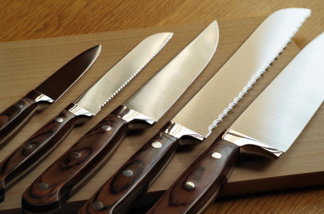 A set of knives with wooden handles