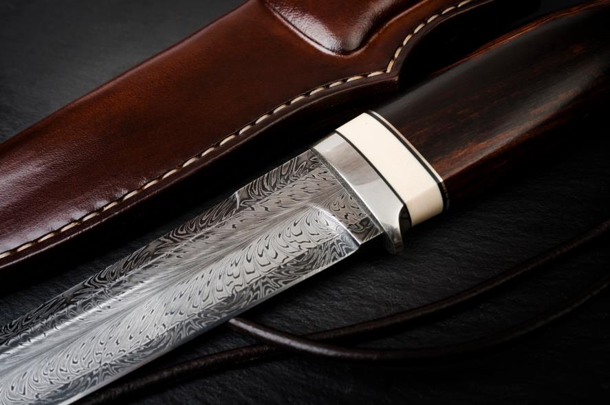 Leather knife sheath and Damascus knife