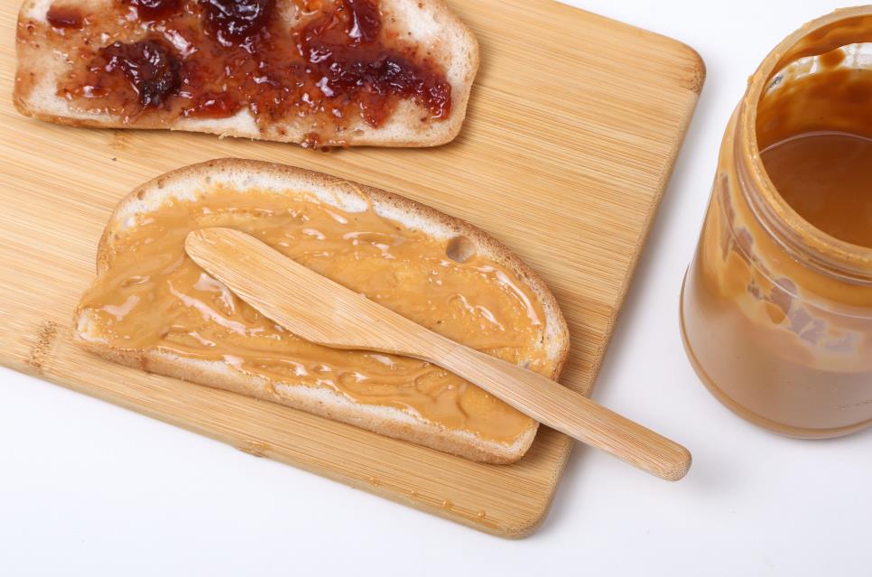 Peanutbutter and jelly on bamboo cutting board