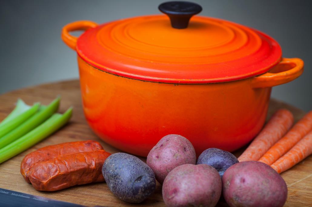 Orange enameled cast iron pot
